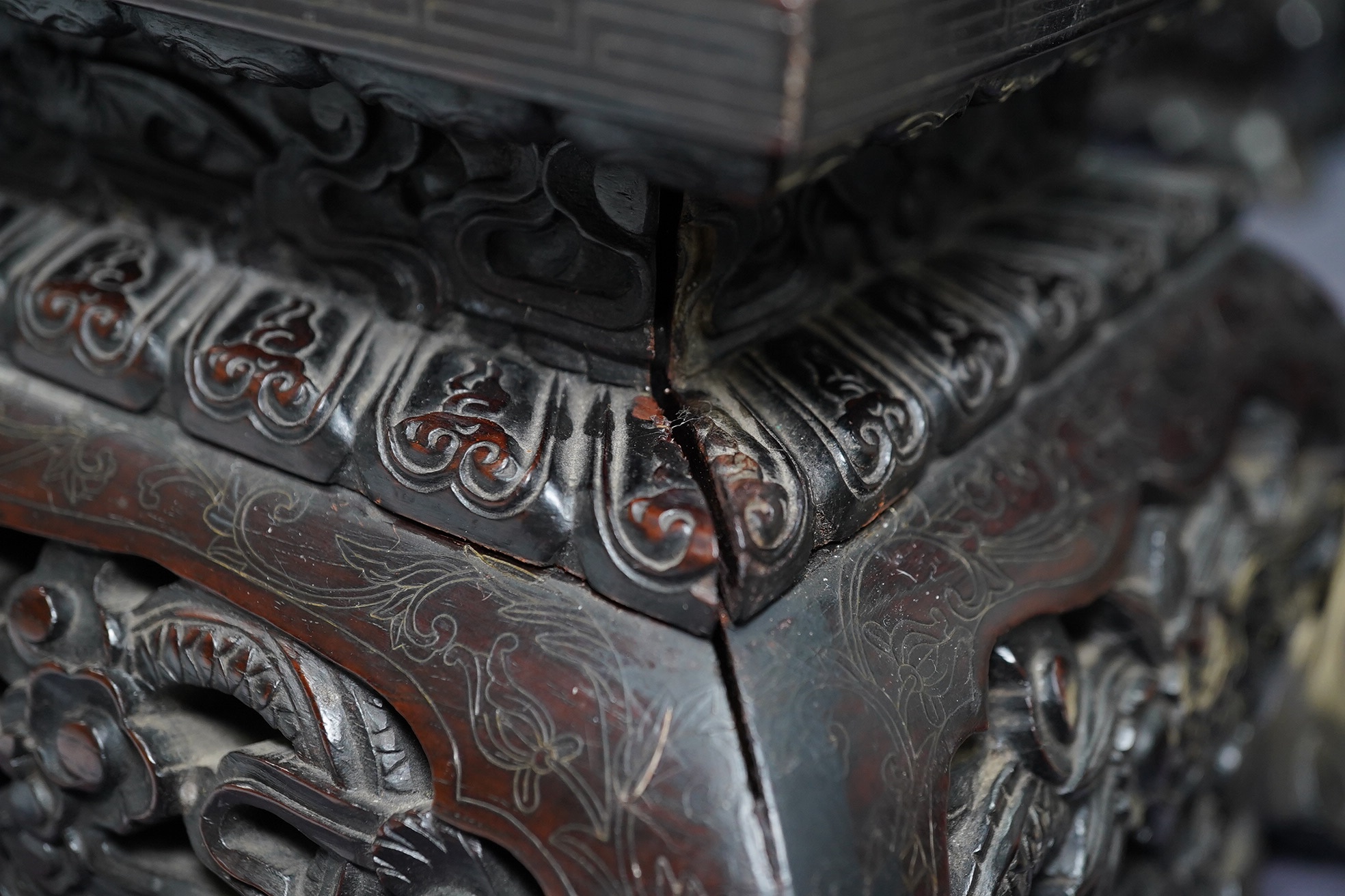 An important pair of Chinese carved zitan and silver wire inlaid ‘cloud and dragon’ curio cabinets and stands, duobaoge, probably Imperial, late Qing dynasty